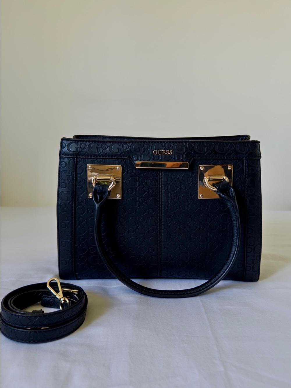 GUESS Black Embossed Logo Satchel with Gold Hardware and Detachable Strap